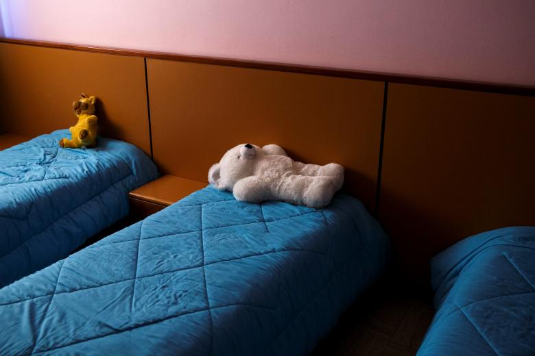 Beds are made to welcome the children for an early afternoon sleep, before leaving for the weekend, at the Model National Nursery of Kallithea, in Athens, Greece. REUTERS/Alkis Konstantinidis