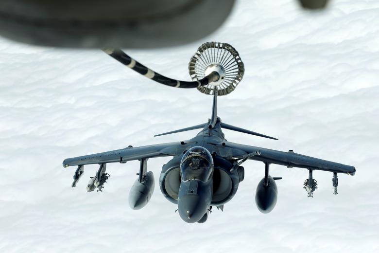 A U.S. Marines Harrier AV-8B makes its way to a fueling boom suspended from a U.S. Air Force KC-10 Extender during mid-air refueling support to Operation Inherent Resolve over Iraq and Syria air space. REUTERS/Hamad I Mohammed