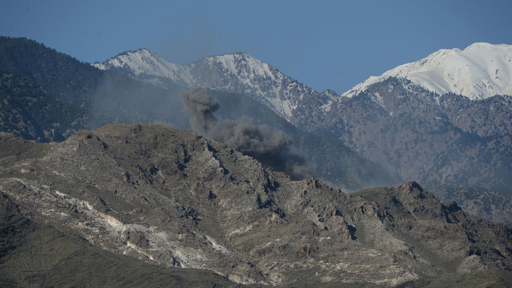 Smoke rises after an air strike on Islamic State (IS) militants positions during an ongoing operation against the group in the Achin district of Afghanistan's Nangarhar province on April 14, 2017, a day after the US military struck the district with its largest non-nuclear bomb. The US military's largest non-nuclear bomb killed dozens of Islamic State militants as it smashed their mountain hideouts, Afghan officials said April 14, ruling out any civilian casualties despite the weapon's destructive capacity. The GBU-43/B Massive Ordnance Air Blast bomb -- dubbed the "Mother Of All Bombs" -- hit IS positions in Achin district in eastern Nangarhar province on April 13.  / AFP PHOTO / NOORULLAH SHIRZADA
